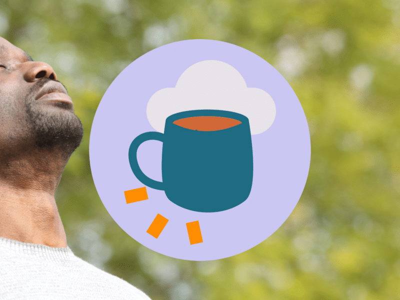 A man breathing in fresh air outside