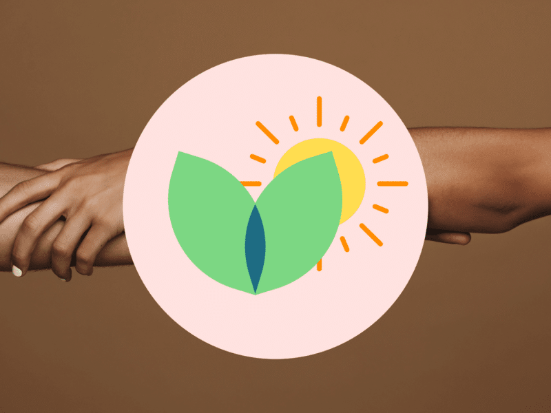 Two black people holding each other's arms, with our Feel Better pillar icon over the top