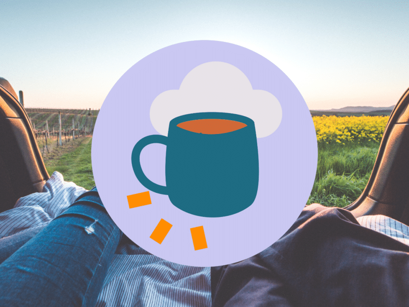 A picture of people sitting in a car looking out at a field with our Rest and Relax pillar icon on