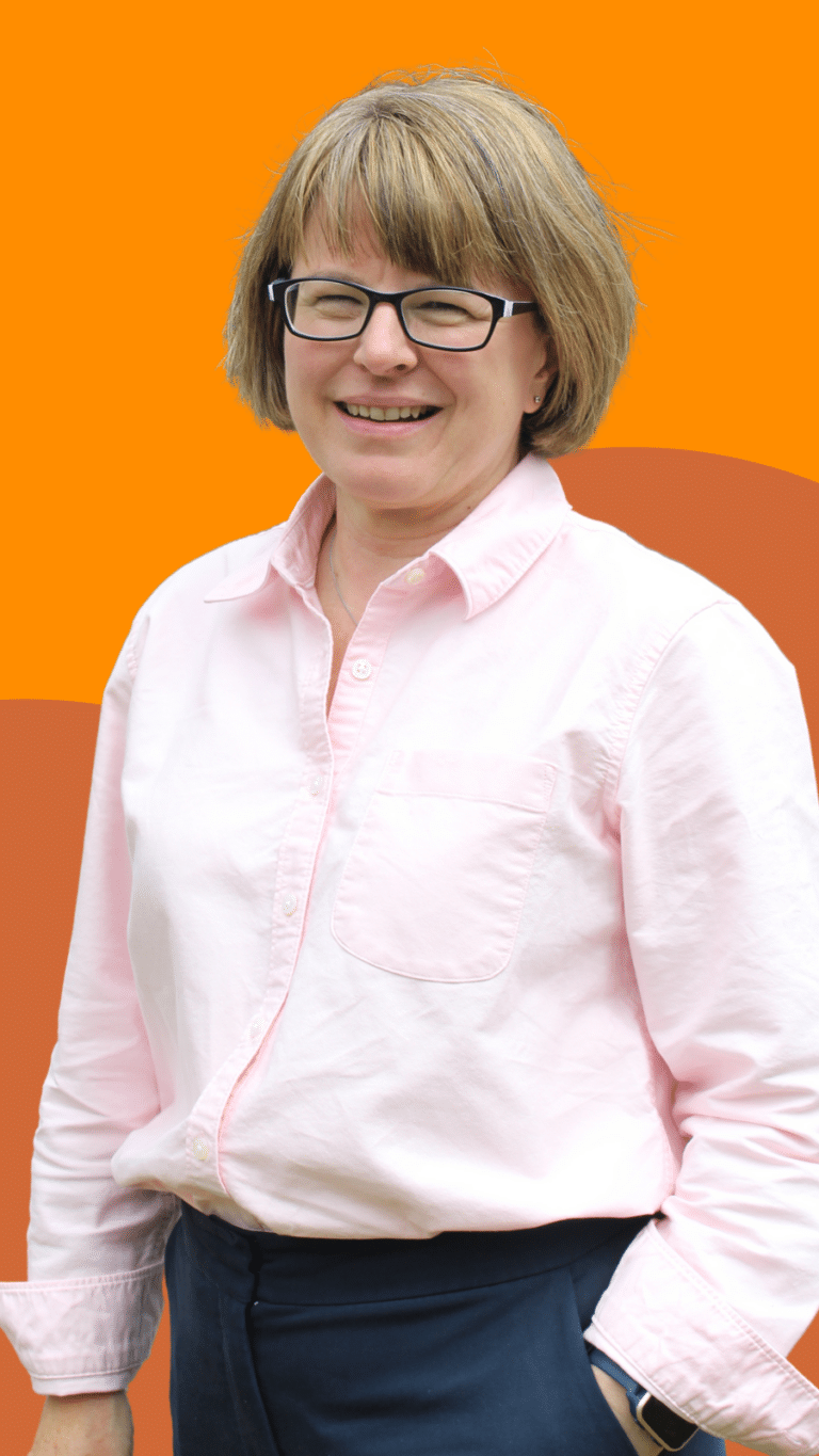 A photo of our Trustee Jayne, a white woman with short brown hair and glasses